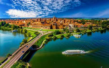 Mantova: Panoramische stadsrondvaart + beschermde oase + gids aan boord